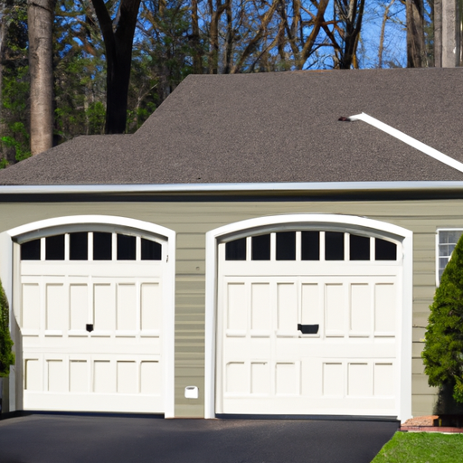 Newly installed sectional garage door on a colonial home driveway in Upper Saddle River, NJ, morning light, no people.